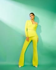 Actress Kriti Sanon in a Neon Yellow Co Ord Set Photos 02