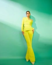 Actress Kriti Sanon in a Neon Yellow Co Ord Set Photos 03