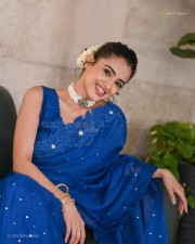 Actress Malvika Sharma in a Blue Sequin Saree at Bhimaa Thanks Meet Photos 09