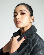 Adorable Actress Rashmika Mandanna in an Oversized Black Puff Jacket with Chic Top and Skirt with Black Leggings Photos 03