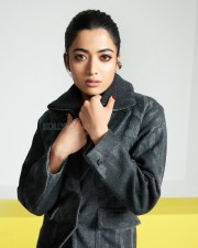 Adorable Actress Rashmika Mandanna in an Oversized Black Puff Jacket with Chic Top and Skirt with Black Leggings Photos 08