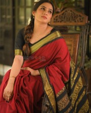 Beautiful Aditi Ravi in a Maroon Silk Saree with Contrast Black Peacock Zari Border Photos 02