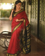 Beautiful Aditi Ravi in a Maroon Silk Saree with Contrast Black Peacock Zari Border Photos 04