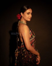 Beautiful Keerthy Suresh in a Multi Coloured Floral Saree with a Heart Shaped Backless Blouse Photos 02