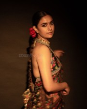 Beautiful Keerthy Suresh in a Multi Coloured Floral Saree with a Heart Shaped Backless Blouse Photos 07