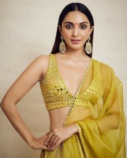 Beautiful Kiara Advani in a Traditional Yellow Lehenga Photoshoot Pictures 01