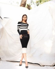 Beautiful Kriti Sanon in a Black and White Ribbed Knit Bodycon Dress Photos 03