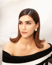 Beautiful Kriti Sanon in a Black and White Ribbed Knit Bodycon Dress Photos 04