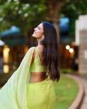 Beautiful Malavika Mohanan in a Parrot Green Saree Photos 03