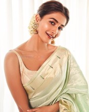 Beautiful Pooja Hegde in a Pista Green Saree Photoshoot Stills 02