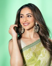 Beautiful Rakul Preet Singh in a Green Printed Saree Photos 03