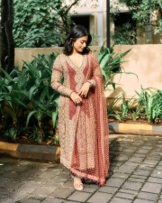 Beautiful Rashmika Mandanna in a Red and Golden Embroidered Kurta Set Photos 04