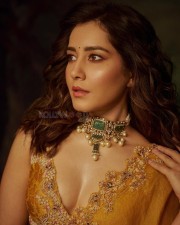 Beauty Queen Raashii Khanna in a Golden Blouse and Silver Skirt Half Saree Photos 03