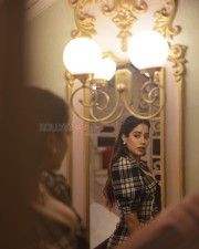 Bollywood Actress Janhvi Kapoor in a Checkered Mini Lace Up Dress Photos 04