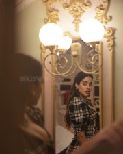 Bollywood Actress Janhvi Kapoor in a Checkered Mini Lace Up Dress Photos 10