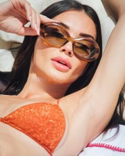 British Bombshell Amy Jackson in an Orange and Light Green Bikini Pictures 04