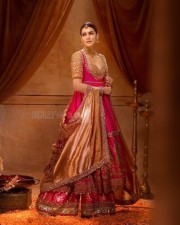 Captivating Kriti Sanon in a Pink Anarkali with Golden Tissue Dupatta Photoshoot Pictures 01