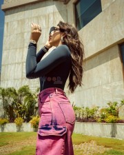 Casual Chick Nora Fatehi in a Black Turtleneck Top and Pink Jeans Photos 03