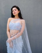 Charming Pranitha Subhash in a Transparent Light Sky Blue Saree Photos 01