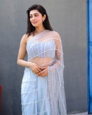 Charming Pranitha Subhash in a Transparent Light Sky Blue Saree Photos 03