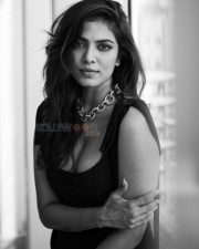 Charming and Curvy Malavika Mohanan in a Black Stills 02