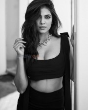 Charming and Curvy Malavika Mohanan in a Black Stills 03