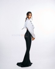 Classy Pooja Hegde in a White Full Sleeve Crop Shirt and Black Pant Photos 01