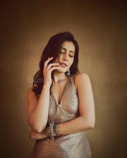 Cute Beauty Raashi Khanna in a Golden and Blue Embroidered Sleeveless Dress Photoshoot Pictures 08