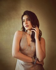 Cute Beauty Raashi Khanna in a Golden and Blue Embroidered Sleeveless Dress Photoshoot Pictures 09