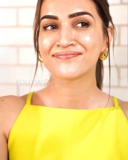 Cute Kriti Sanon in a Bright Yellow Top Pictures 01