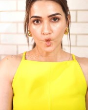 Cute Kriti Sanon in a Bright Yellow Top Pictures 06