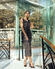 Dazzling Pooja Hegde in a Black Sleeveless Tweed Dress Pictures 02