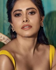 Elegant Beauty Nushrratt Bharuccha Cleavage in a Yellow Bodycon Dress Photos 01