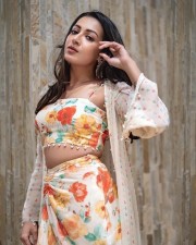 Elegant Catherine Tresa in a Floral Red and Cream Sleeveless Crop Top with a Matching CoOrd Skirt Photos 02