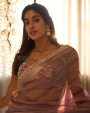 Elegant Janhvi Kapoor in a Sheer Teal and Pink Saree Photos 03