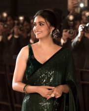 Elegant Keerthy Suresh in a Green Shimmery Saree with Sleeveless Blouse Photos 04