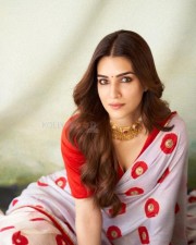 Elegant Kriti Sanon in a Red and White Floral Saree Photos 01