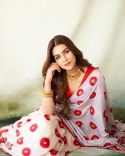 Elegant Kriti Sanon in a Red and White Floral Saree Photos 03