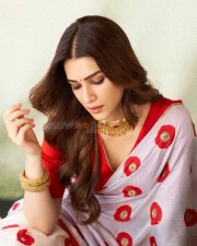 Elegant Kriti Sanon in a Red and White Floral Saree Photos 07