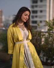 Elegant Rakul Preet Singh in a Grey Dress with a Yellow Jacket Photos 03