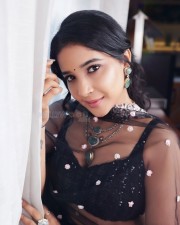 Glamorous Sakshi Agarwal in a Black Floral Lehenga Photos 06