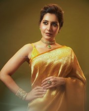 Golden Beauty Raashi Khanna in a Yellow Silk Saree with Sleeveless Blouse Pictures 01