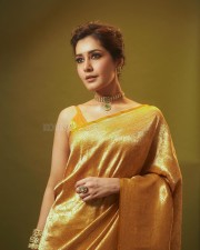 Golden Beauty Raashi Khanna in a Yellow Silk Saree with Sleeveless Blouse Pictures 06