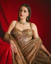 Gorgeous Ananya Panday in a Golden Saree with a Corset Style Blouse Pictures 02