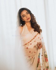 Gorgeous Keerthy Suresh in a White Floral Saree with Sleeveless Halter Neck Blouse Pictures 03