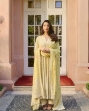 Gorgeous Nora Fatehi in a Yellow Embroidered Anarakli Suit Photos 02