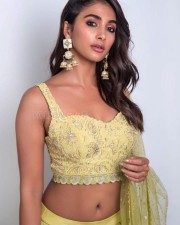 Gorgeous Pooja Hegde in a Ethnic Yellow Lehenga Photos 02