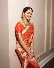 Gorgeous Pooja Hegde in an Orange Kanchipuram Silk Saree Photos 01