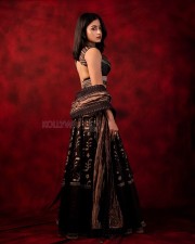 Gorgeous Rashmika Mandanna in a Black and Gold Lehenga Choli Photos 03