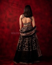 Gorgeous Rashmika Mandanna in a Black and Gold Lehenga Choli Photos 06